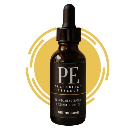 Black Prescribed Essence mailer boxes with dropper bottles on grey stone