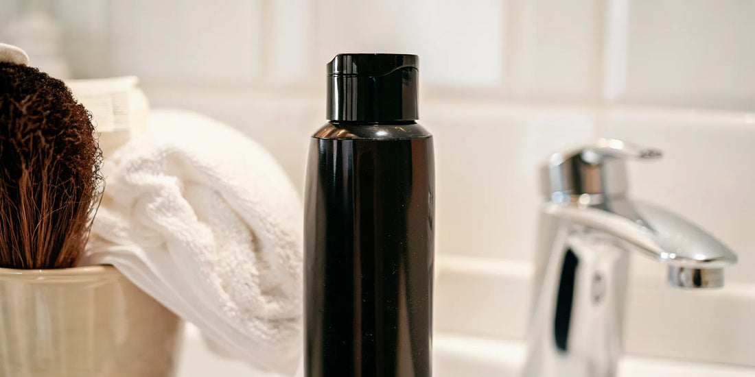 Prescription ketoconazole shampoo bottle in a clean modern bathroom setting, representing clinical hair loss treatment