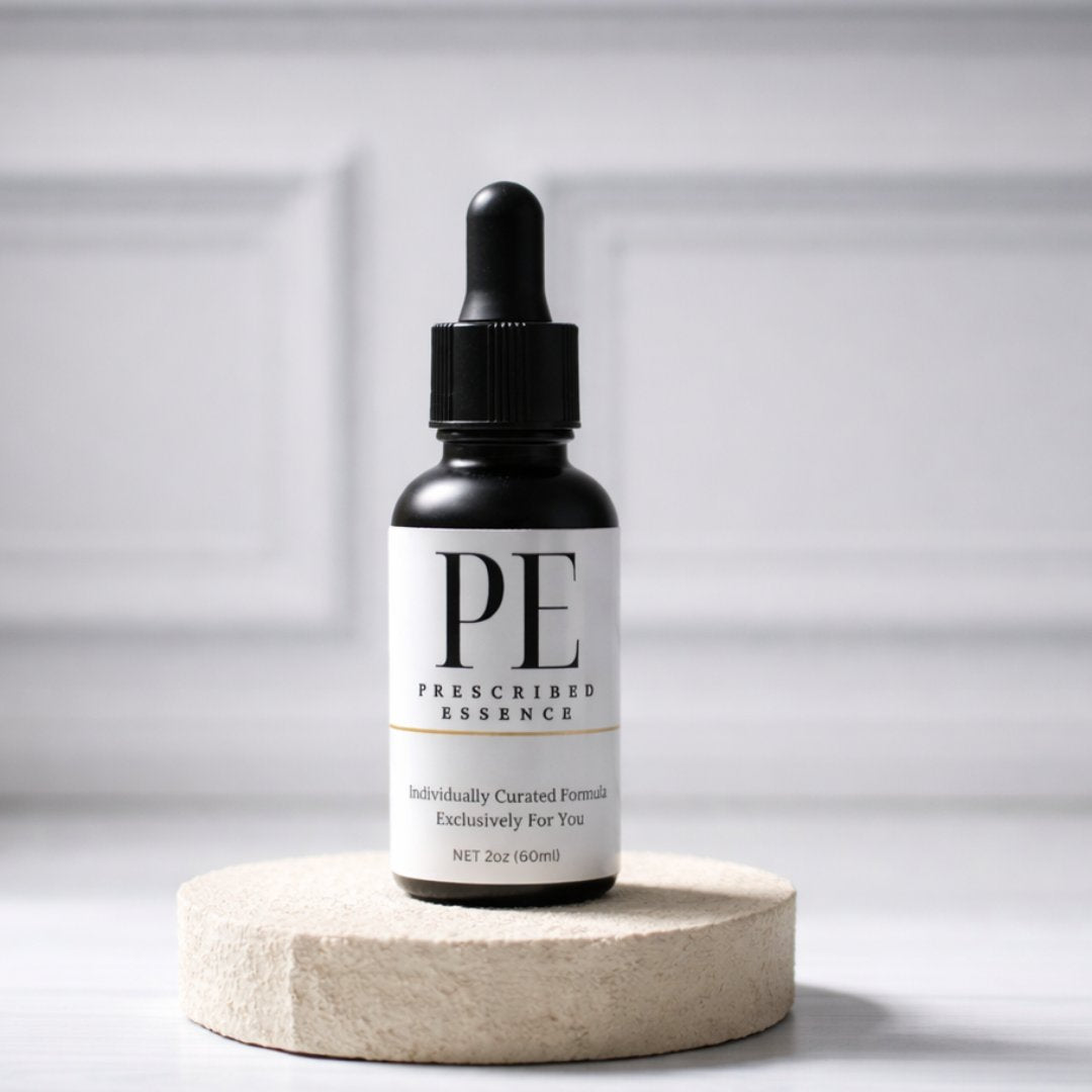 Prescribed Essence dropper bottle on a stone plinth