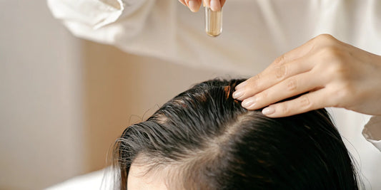Close-up of healthy hair on a scalp with warm lighting, representing dermatological treatment